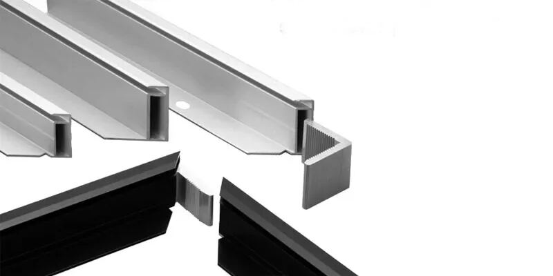 Silver and black anodized frame profiles with corner key